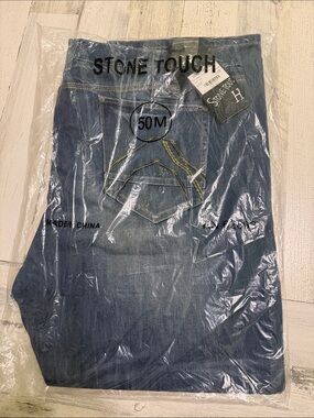NWT.  Stone touch.  Size 50. Blue jeans